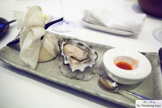 Oyster (from French region) on the half shell served with Tabasco sauce