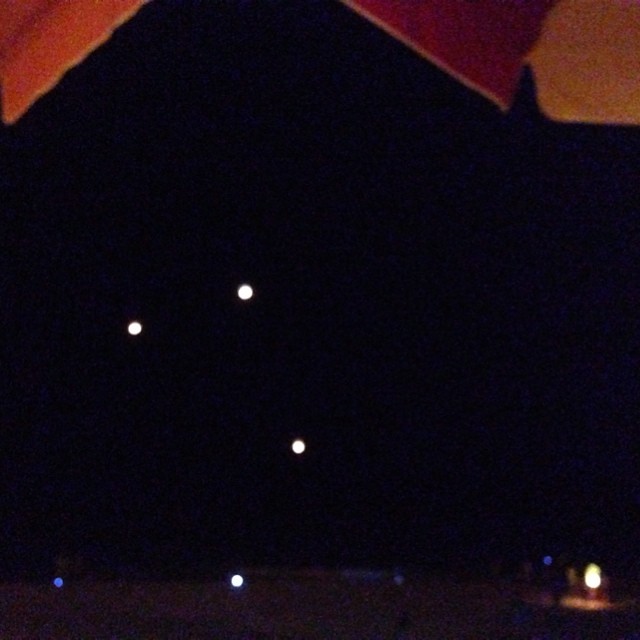 Watching barrel lanterns floating above the beach as we eat dinner.  Feel like I am in the Tangled movie! So, so cool!