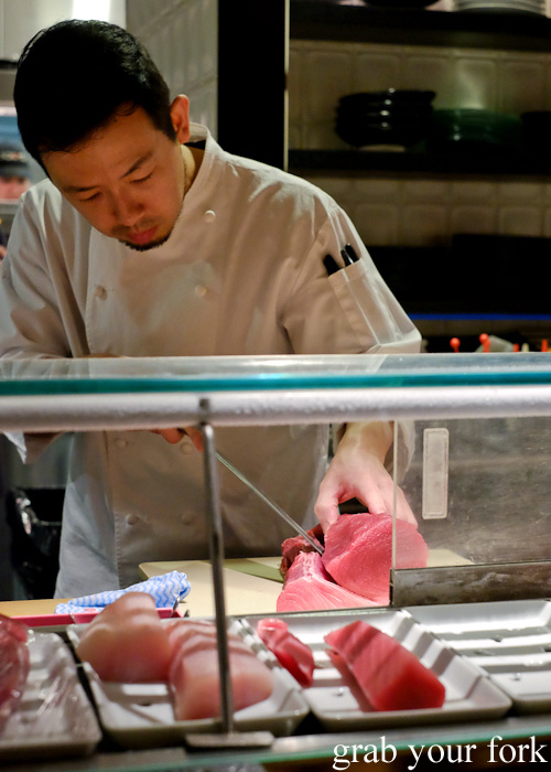 Chef Chase Kojima filleting a tuna tail at Sokyo at The Star, Pyrmont