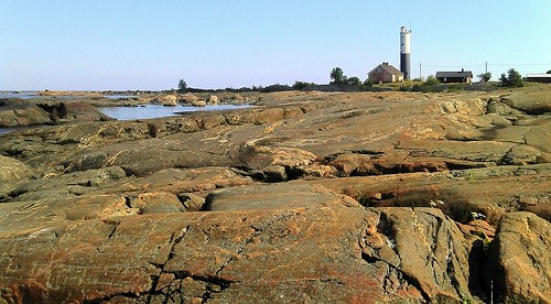 sea sky lighthouse rocks cliffs