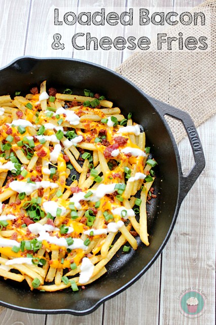 Loaded Bacon & Cheese Fries in a black skillet.