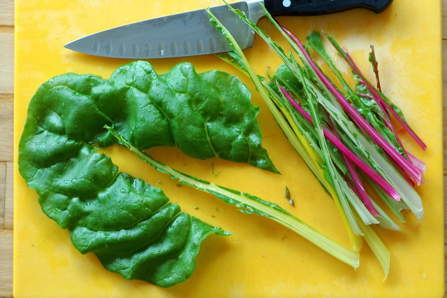 Removing the ribs from the chard leaves by Eve Fox, the Garden of Eating, copyright 2014