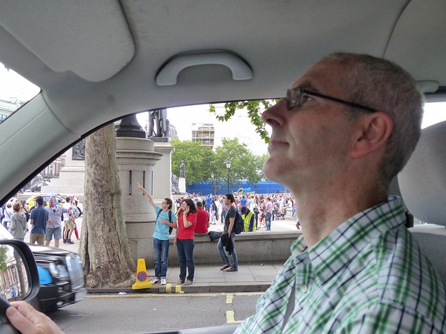 Scott successfully driving through Trafalgar Square. We are lunatics.