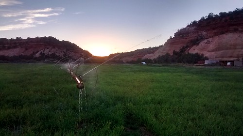 ranch sunset hay southernutah kanab irrigation sprinklers