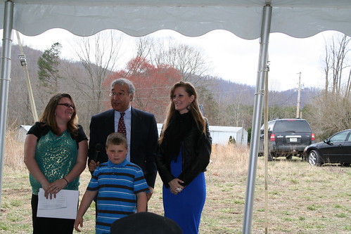 Left to right: Homeowner Linda Sawyers and son Jacob, RHS Administrator Hernandez and homeowner Ashley Warren.