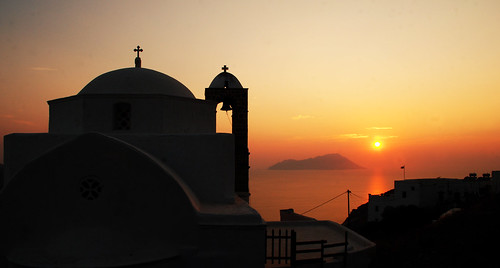 travel light sunset sea summer panorama sun reflection church architecture contrast greek islands cross hard aegean greece plaka milos