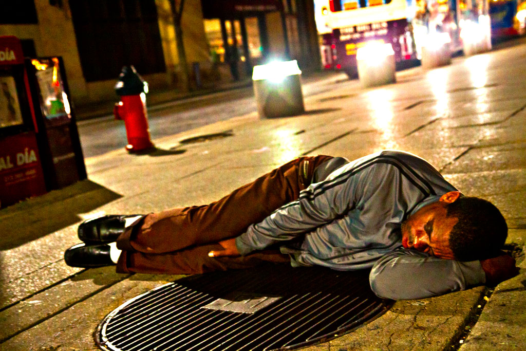 Man-sleeping-over-grate-outside-Marriot-Downtown-on-9-14-14--Center-City