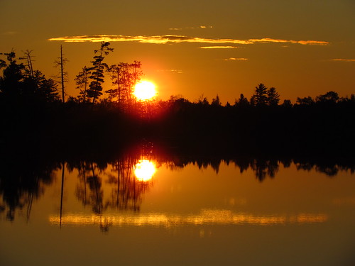 camping trees sunset sky orange sun lake black nature water wisconsin clouds reflections pines gordonlake