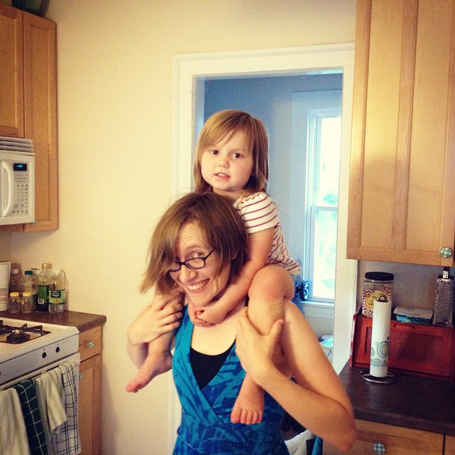 Carrying a very big girl on my fairly small shoulders.