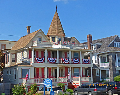 beach architecture seaside newjersey columns victorian americanflag capemay gingerbreadhouse jerseyshore railings beachave porches coupla advertisingsign capemaycounty barrierisland pinkshutters nearqueenst americanbunting centercoupla 931beachhouse 932beachguesthouse askaboutweeklyrentals