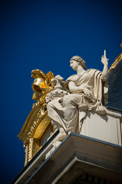 Sculpture on the roof of the Palace of Versailles