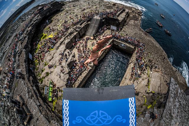 Jonathan Paredes of Mexico dives from the 28 metre platform during the first round of the third stop of the Red Bull Cliff Diving World Series, Inis Mor, Aran Islands, Ireland on June 28th 2014.  // Romina Amato/Red Bull Cliff Diving // P-20140628-00283 /