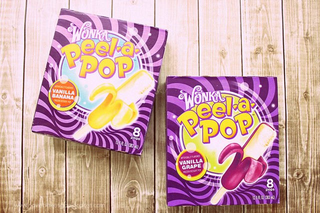 Two boxes of Wonka Peel-a-pop vanilla banana and vanilla grape.