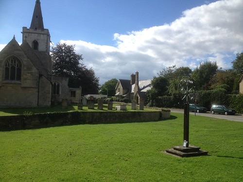 Coton village sign and church