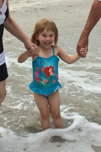 Lucy loving the beach