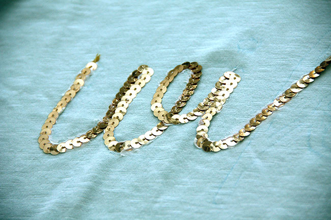 Instructions_Close-up-of-sequins-being-glued