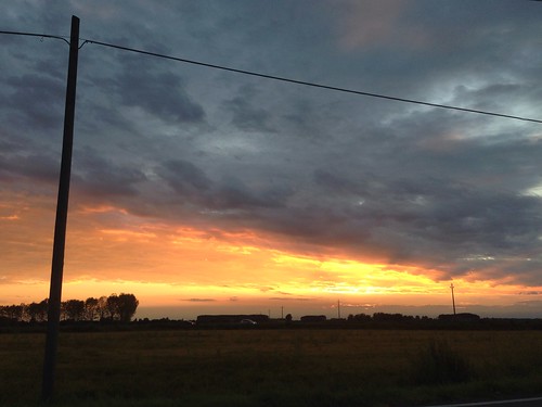 sunset sky italy sun storm clouds europe rice fields lombardy cassolnovo