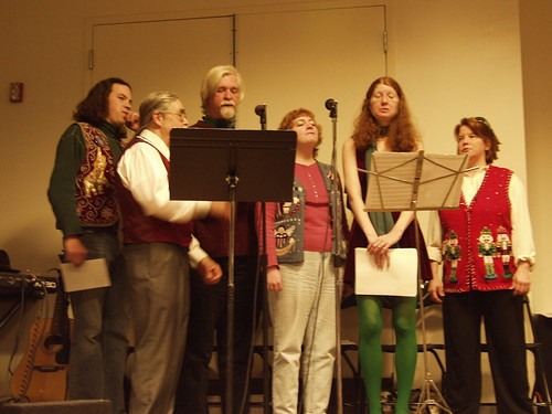 The ARTC Chorus gathers around the microphones.