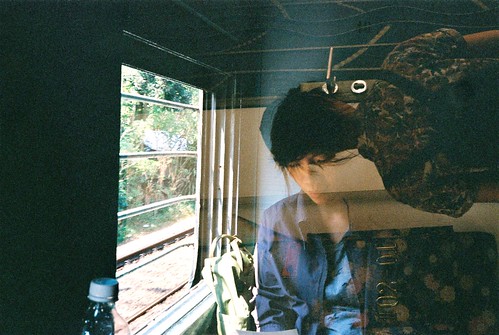 35mm film doubleexposure people india indian train reading books window light singapore mailbox girl walking hands art vintage yashica shadow read book