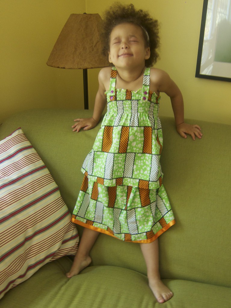 Matching wax print cousins outfits: Made by Rae Baby Sunsuit as top, Oliver + S Lazy Days skirt