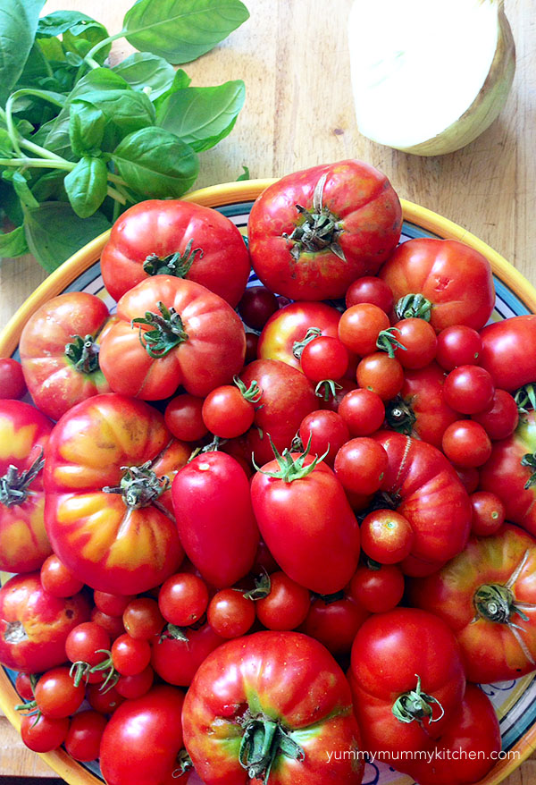 A platter of beautiful fresh garden tomatoes. 