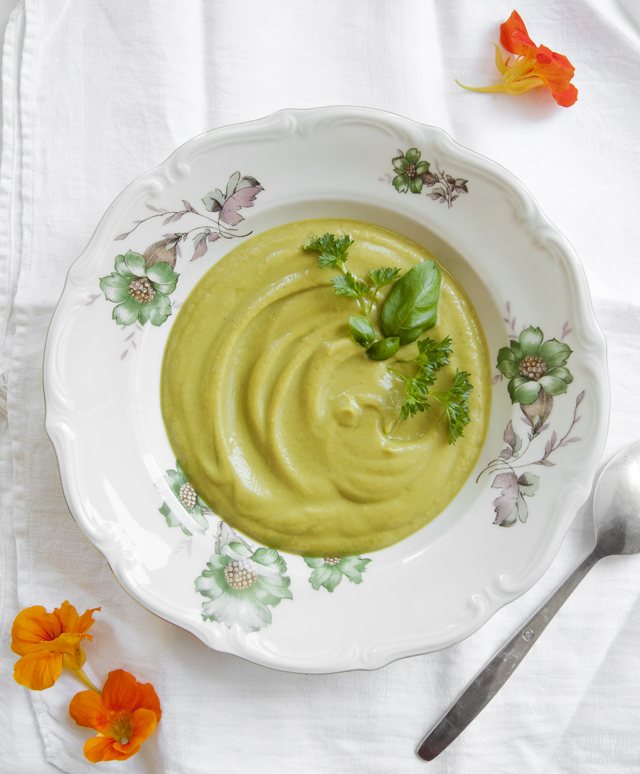 Cream of broccoli and fava beans soup with basil