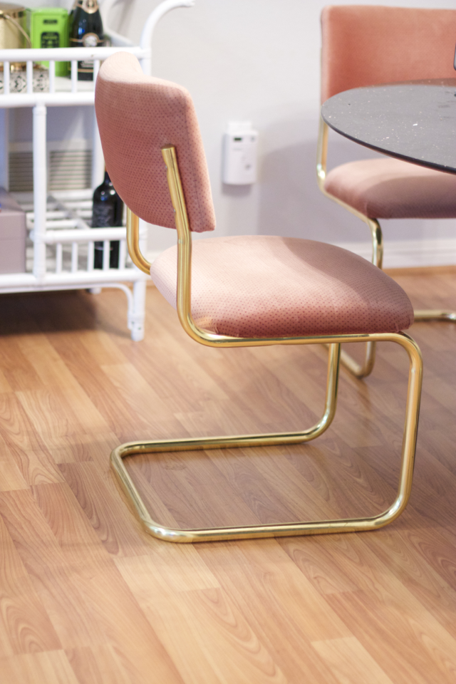 brass and blush dining room chair