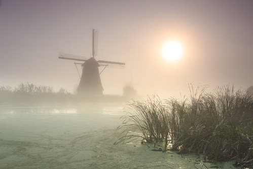 kinderdijk zuidholland netherlands unesco heritage windmill mist nederland holland water reflection sunrise