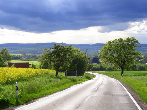 road blue trees sun green nature sunshine weather yellow clouds germany way landscape deutschland countryside spring colours hessen path sunny hills hesse