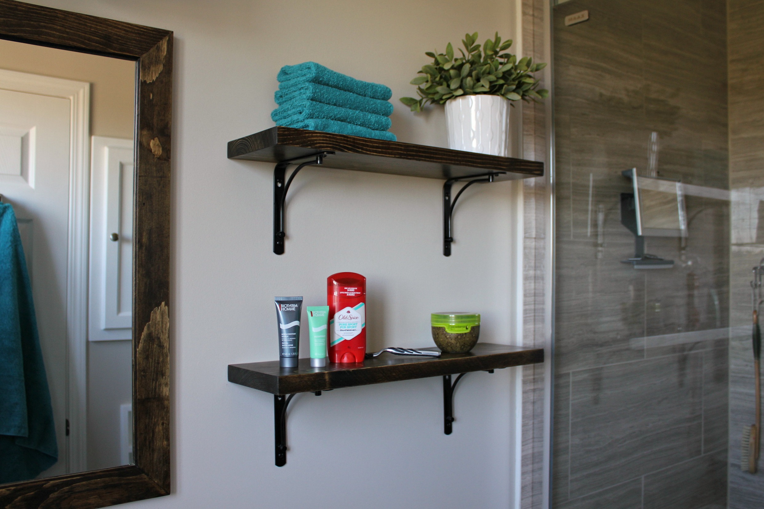 ensuite bathroom renovation tile frameless shower custom shelves