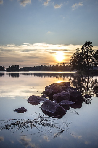 blue trees sunset sky sun sunlight lake fall water clouds reflections rocks sweden stones silhouettes swedish bluehour straws