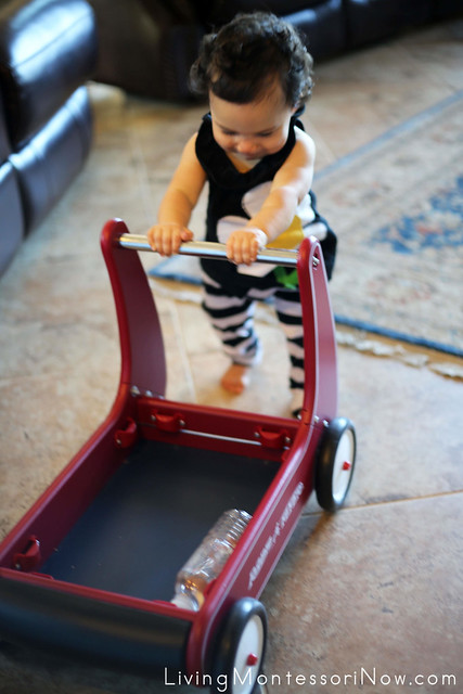 Giving the Sensory Bottle a Ride in the Radio Flyer Walker Wagon