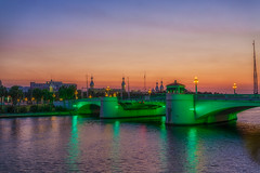 Green Kennedy Bridge and the University of Tampa at Sunset Merge