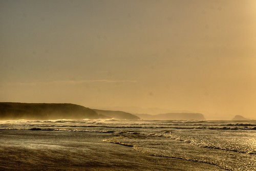 sunset beach atardecer asturias playa olas reflejos dorado espuma xagó