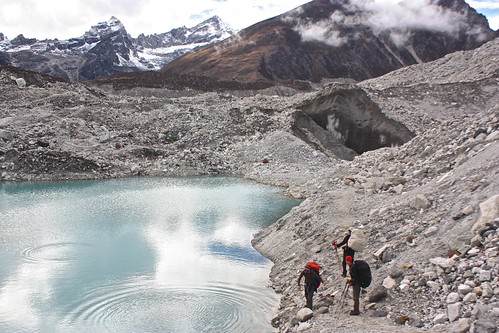 skipping rocks on a glacial lake