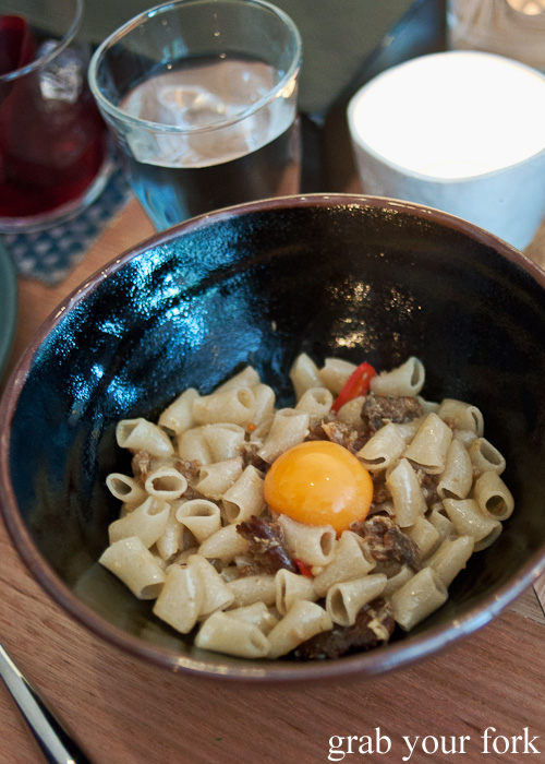 Macaroni, pigs head and egg yolk at ACME, Rushcutters Bay