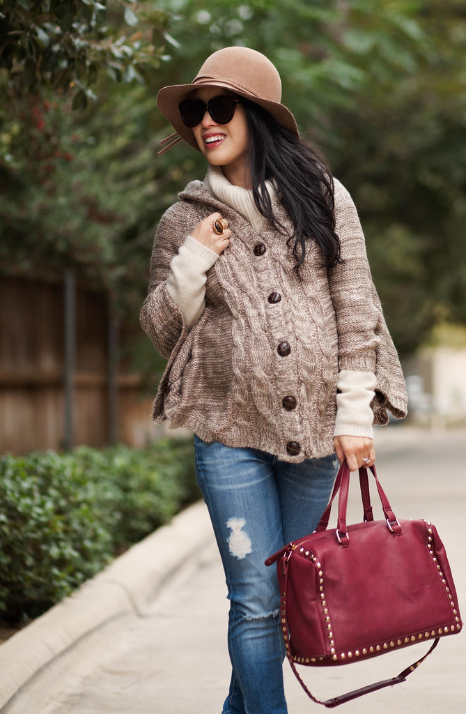 cute & little blog | petite fashion | maternity baby bump pregnant | knit cape poncho wool sweater, cowl sweater, distressed jeans, burgundy ankle boots, taupe wool felt floppy hat, burgundy studded satchel | winter layering outfit | third trimester