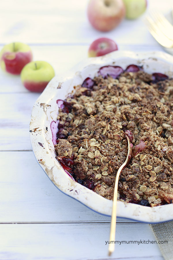 Blueberry apple crisp with oat topping in a pie dish. 