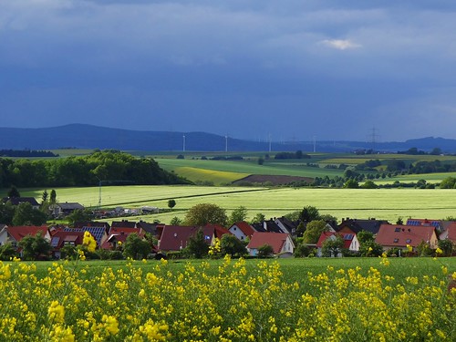 houses light sky sunlight nature architecture clouds buildings germany landscape deutschland town spring hessen view hills fields hesse