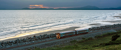 sunset sea reflection beach water wales silver evening coast rocks diesel dusk trains coastline railways unit arriva cardiganbay dmu class158 llanaber sydyoung