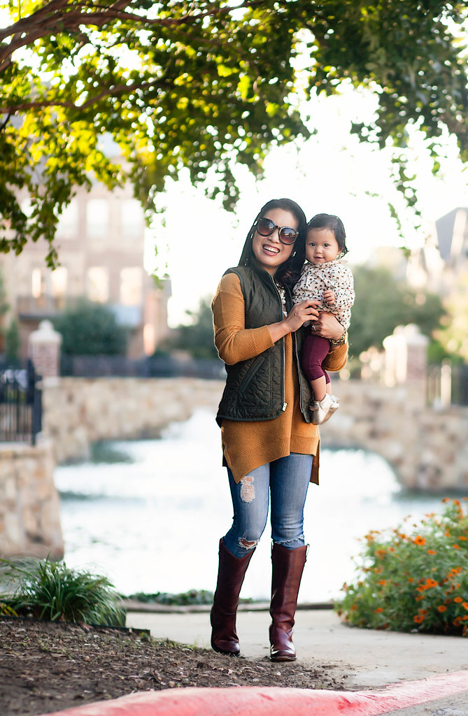 cute & little blog | army green quilted puffer vest, mustard sweater, distressed jeans, riding boots | mommy + me | fall outfit