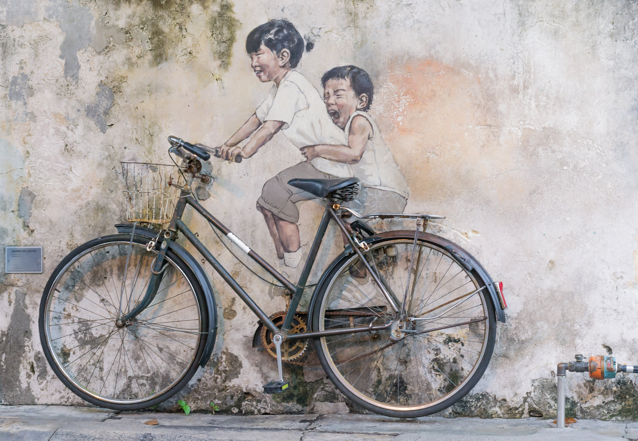 Kids on a bicycle, Armenian Street, George Town, Penang