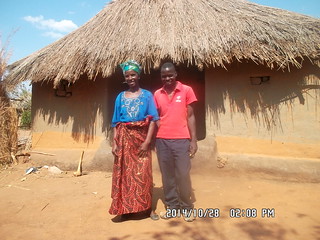 Mrs. Tichoke Phiri with her son, Kenneth, at their homestead in Kawalala Camp, Katete District Photo credit: Cannon Mukuma/IITA