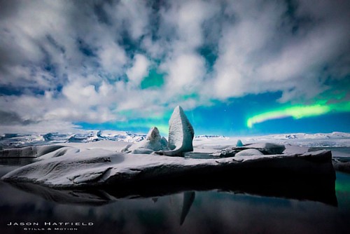 A moonlit iceberg at Jökulsárlón Glacial Lagoon, Iceland.  #exploremore #TPSAffinity #iceland #glacier #iceberg #northernlights #aurora #nightphotography #Reflection #earth_deluxe #NatGeo #natureisawesome #ice #lake #snow #visiticeland #winterwonderland #