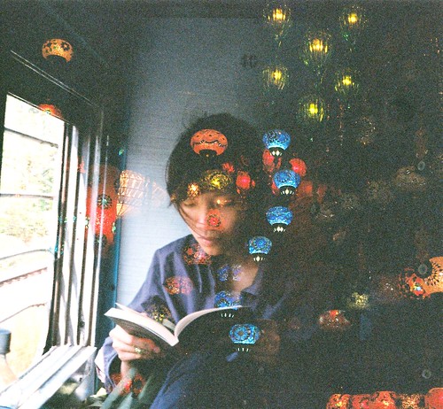 35mm film doubleexposure india indian train window books reading people lamps colors colorful singapore turkish girl vintage old art hands railway yashica light shadow read book