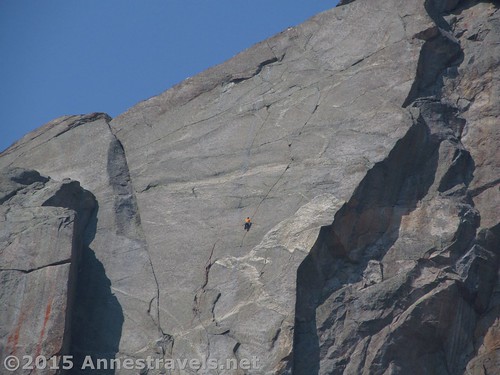 A rock climber ascends Sundance Pinnacle above Jackass Pass, Wind River Range, Wyoming