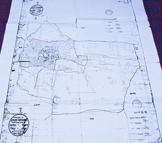 The outer and inner purple borders in the map show the total area of Paraswani village before and after mining activities began.