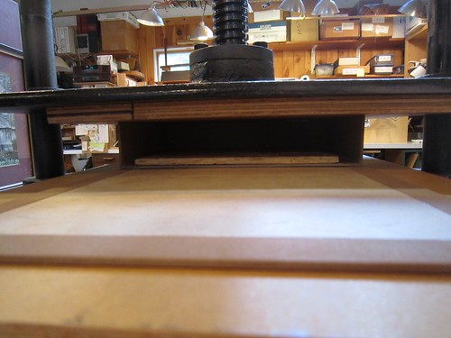Clamshell box in the press