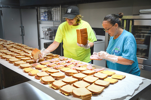 KCEOC staff, Latisha Smith (left) and Daphne Karr, preparing up to 1,800 sack lunches each day