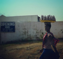 Beautiful Nigerian women selling goods to those in passing cars #nigerianwoman #lagosnigeria #worldtravel